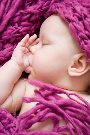 Portrait of a 2 months sleeping baby girl.