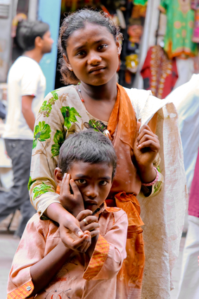 Two children begging